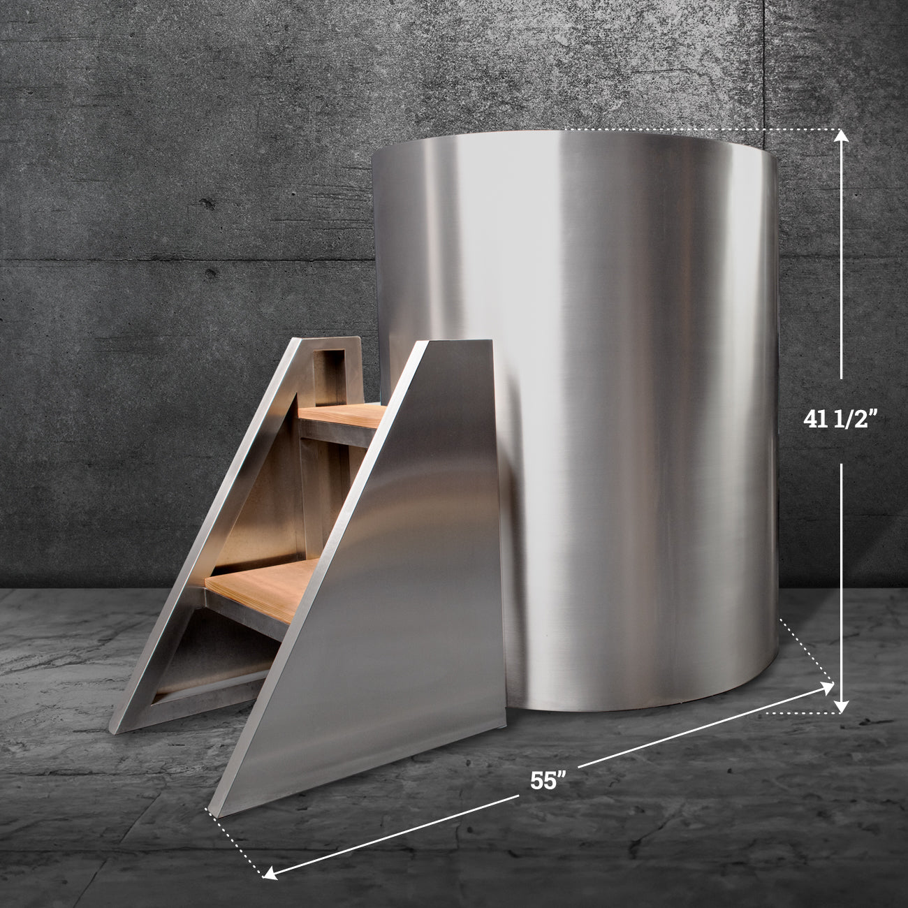 The Cyber Barrel Commercial Cold Plunge is a modern, cylindrical tub made from marine-grade stainless steel with an angled wooden-step ladder, measuring 41.5 tall and 55 long—ideal for recovery sessions on a concrete floor against a concrete wall.