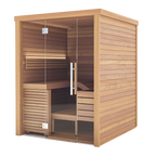 The Baia Glass Sauna is a square indoor cabin featuring a glass front door and internal bench seating.