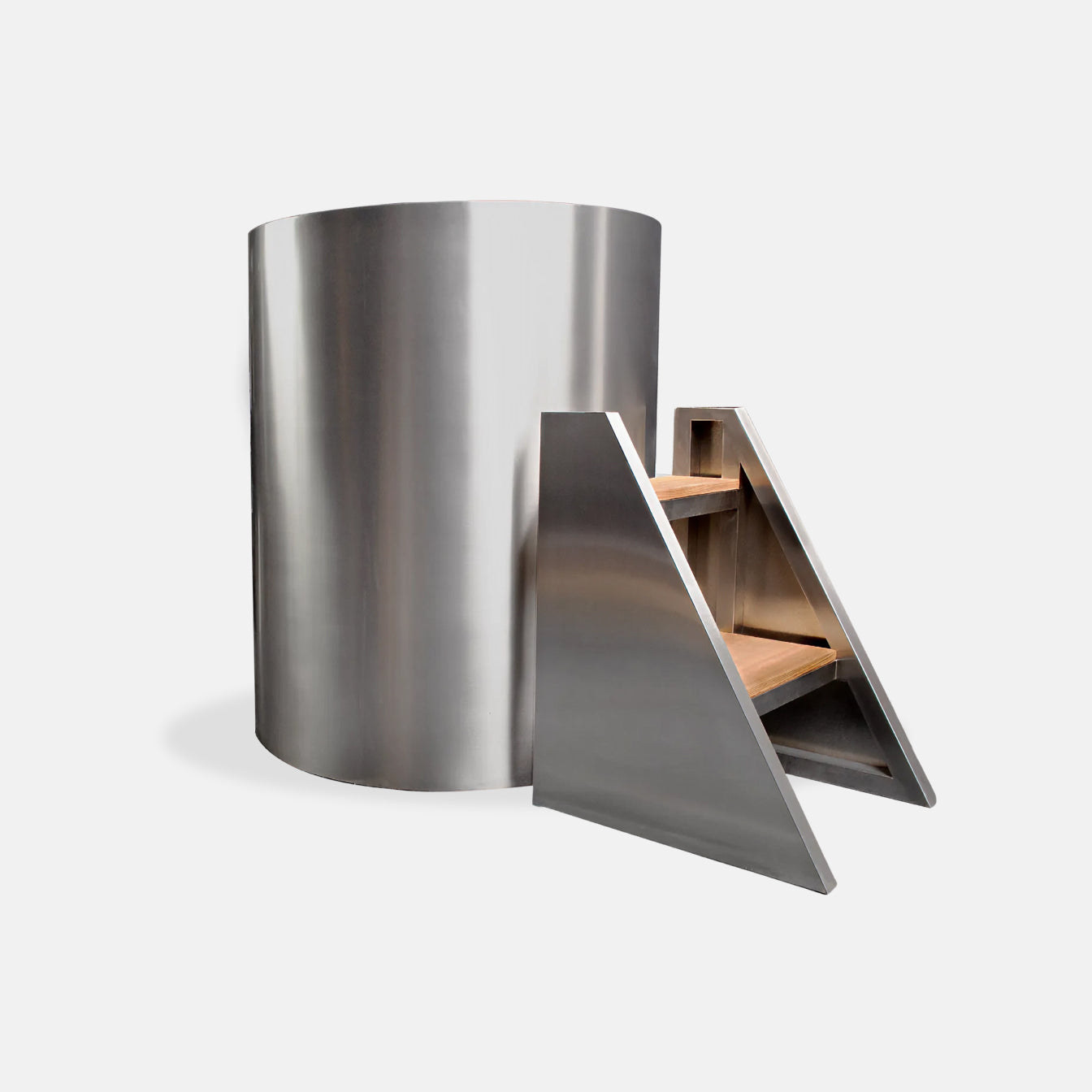 The Cyber Barrel Commercial Cold Plunge is a modern cylindrical stainless steel tub with a matching step stool featuring two wooden steps—perfect for cold immersion in commercial settings.