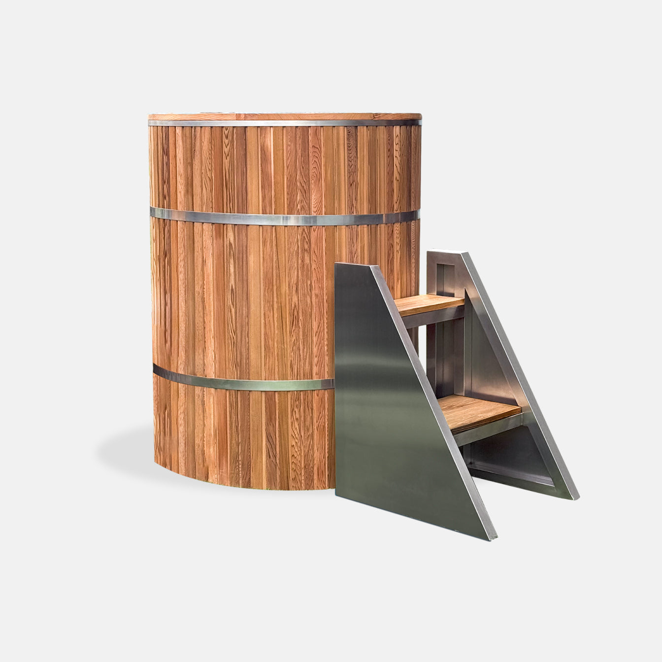 The Star Treatment 2.0 Commercial Cold Plunge is a tall, cylindrical wooden ice bath with stainless steel bands and a matching small metal staircase with wooden steps, set against a plain white background—ideal for cold plunge therapy.