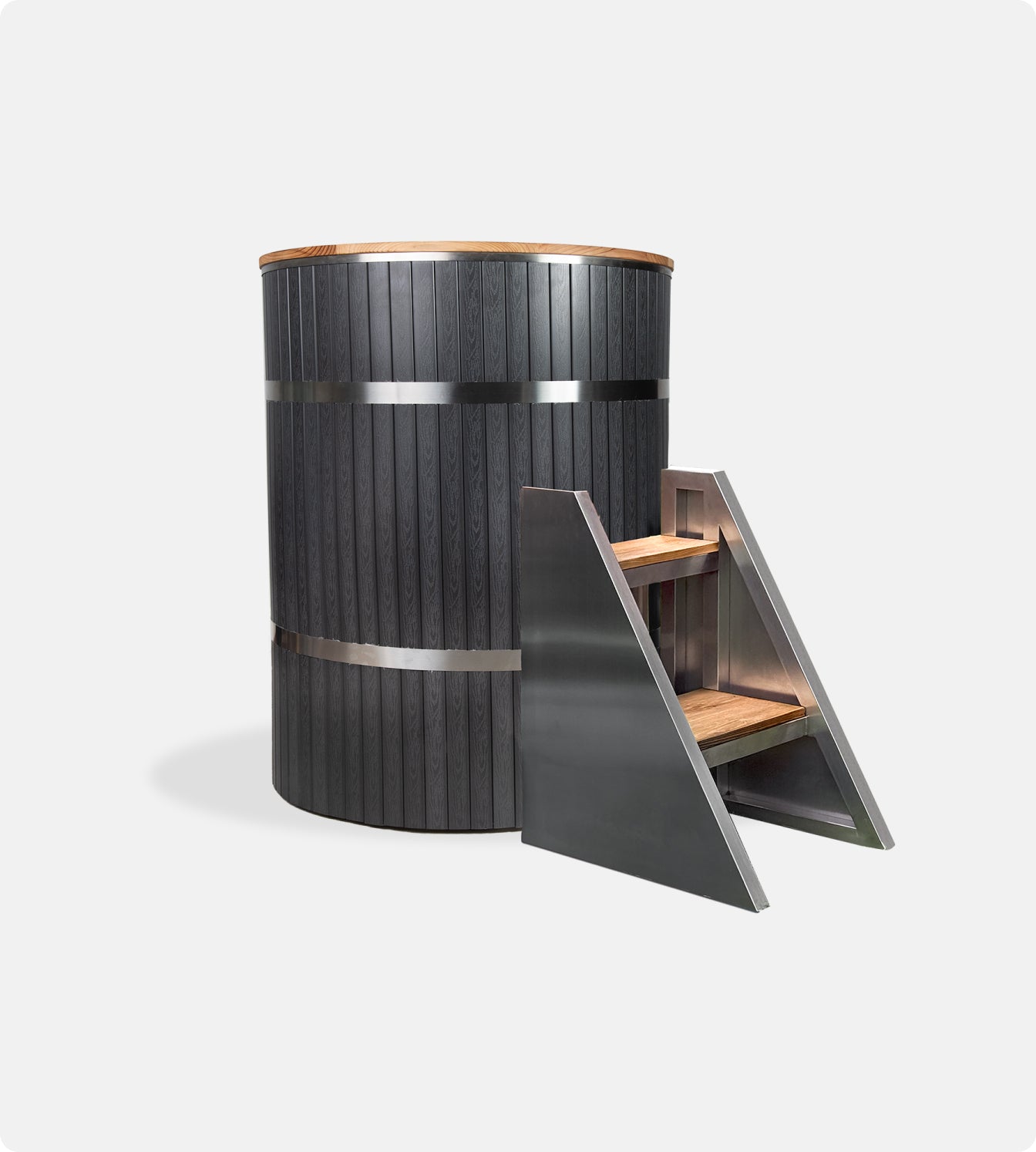 The Star Treatment 2.0 Commercial Cold Plunge is a tall, round black tub with stainless steel bands and wood accents, plus a matching two-step wood and metal staircase for easy access—ideal for cold therapy sessions. Shown on a plain white background.