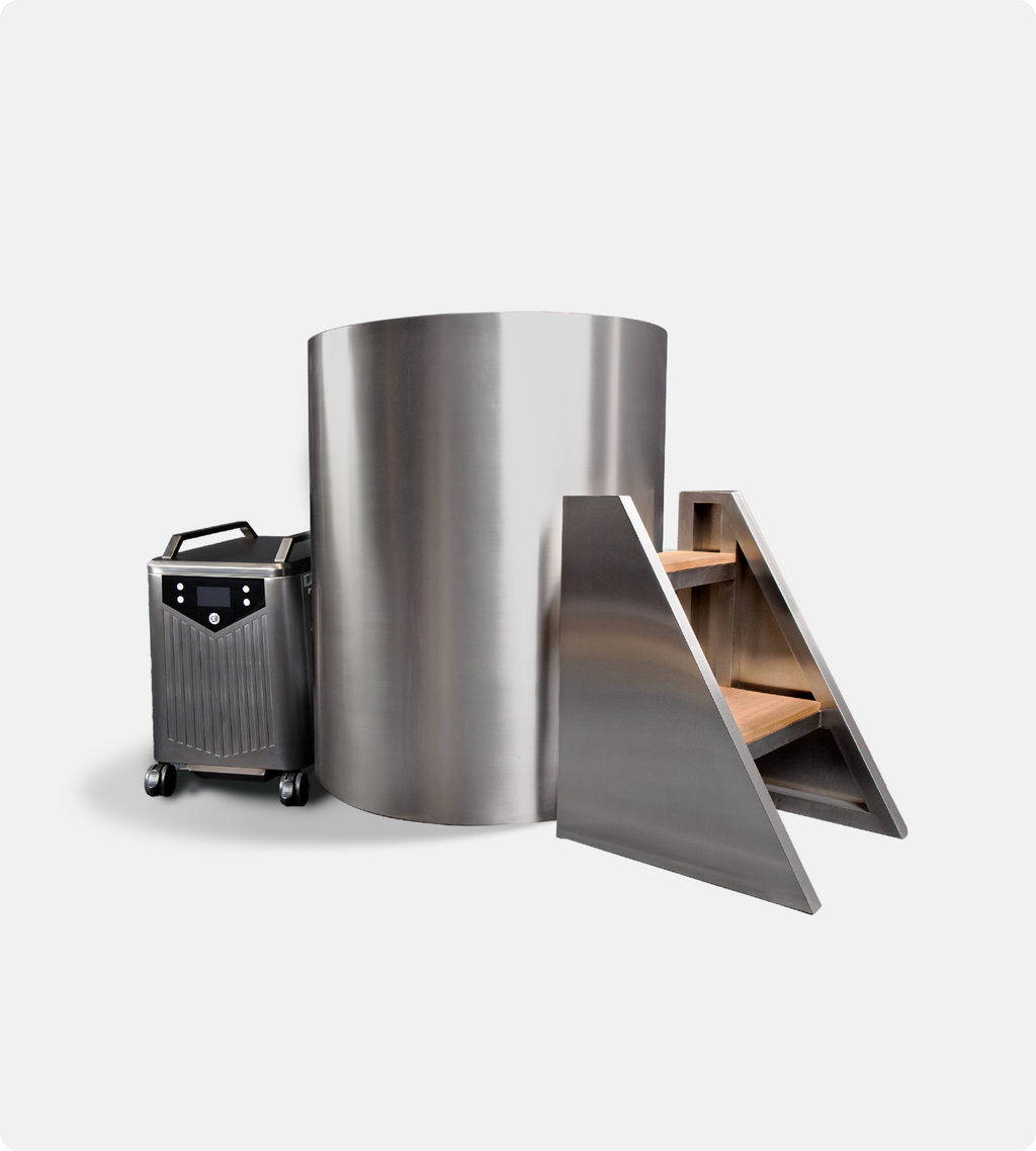 The Cyber Barrel Cold Plunge is a large, cylindrical marine-grade stainless steel chamber with wooden steps and a portable electronic control unit on wheels, designed as a vertical cold plunge, shown against a plain white background.