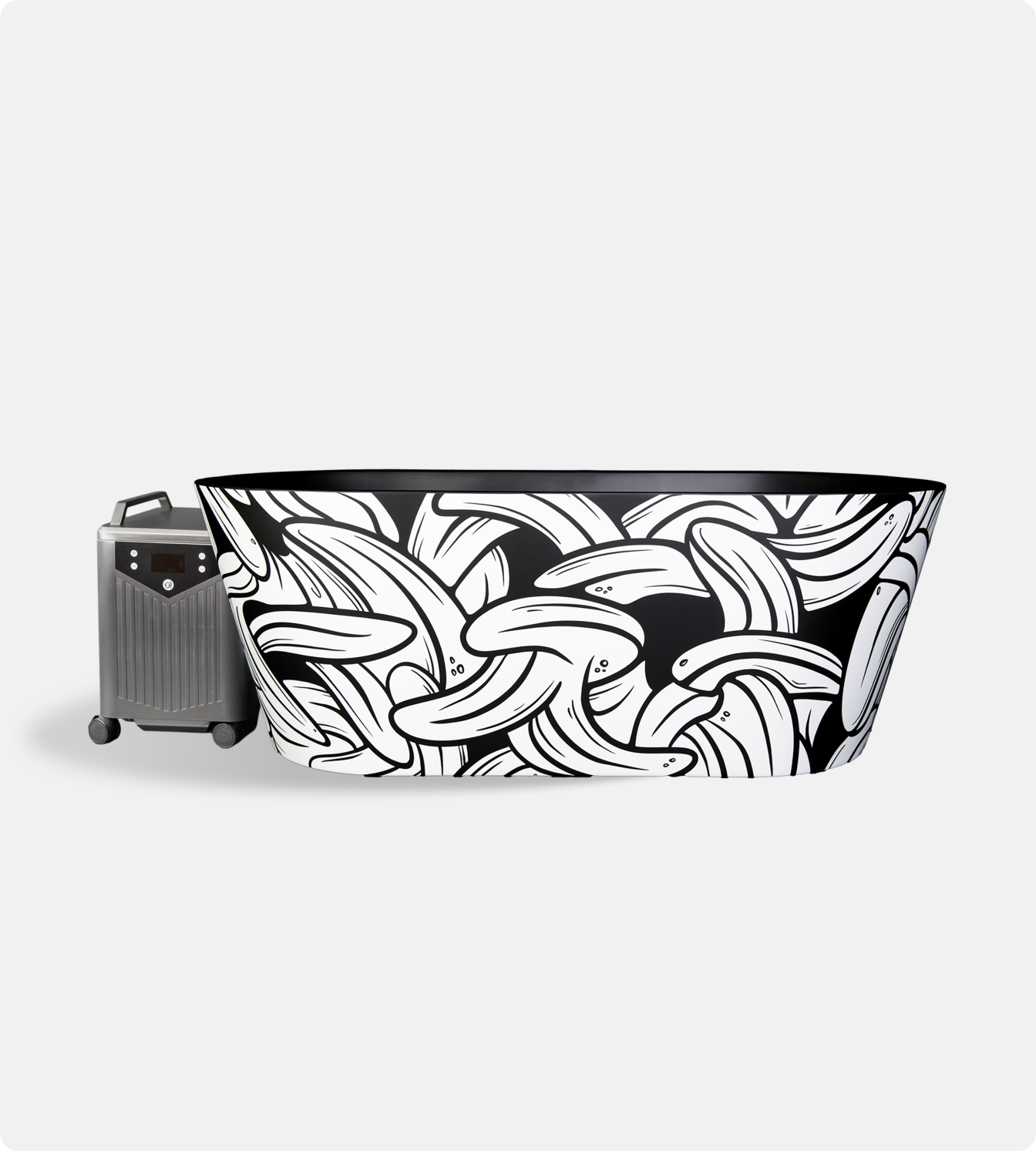 The Brainpod 2.0 Cold Plunge is a black and white insulated acrylic freestanding tub with overlapping banana patterns, paired with a silver and black portable water heater on wheels—ideal for cold plunges against a plain white background.