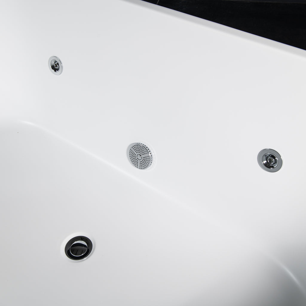 Close-up of the Brainpod 2.0 Commercial Cold Plunges white acrylic interior, showing three metallic jets, a circular mesh drain or speaker, and part of the tub edge; its clean, smooth surface highlights ergonomic design.