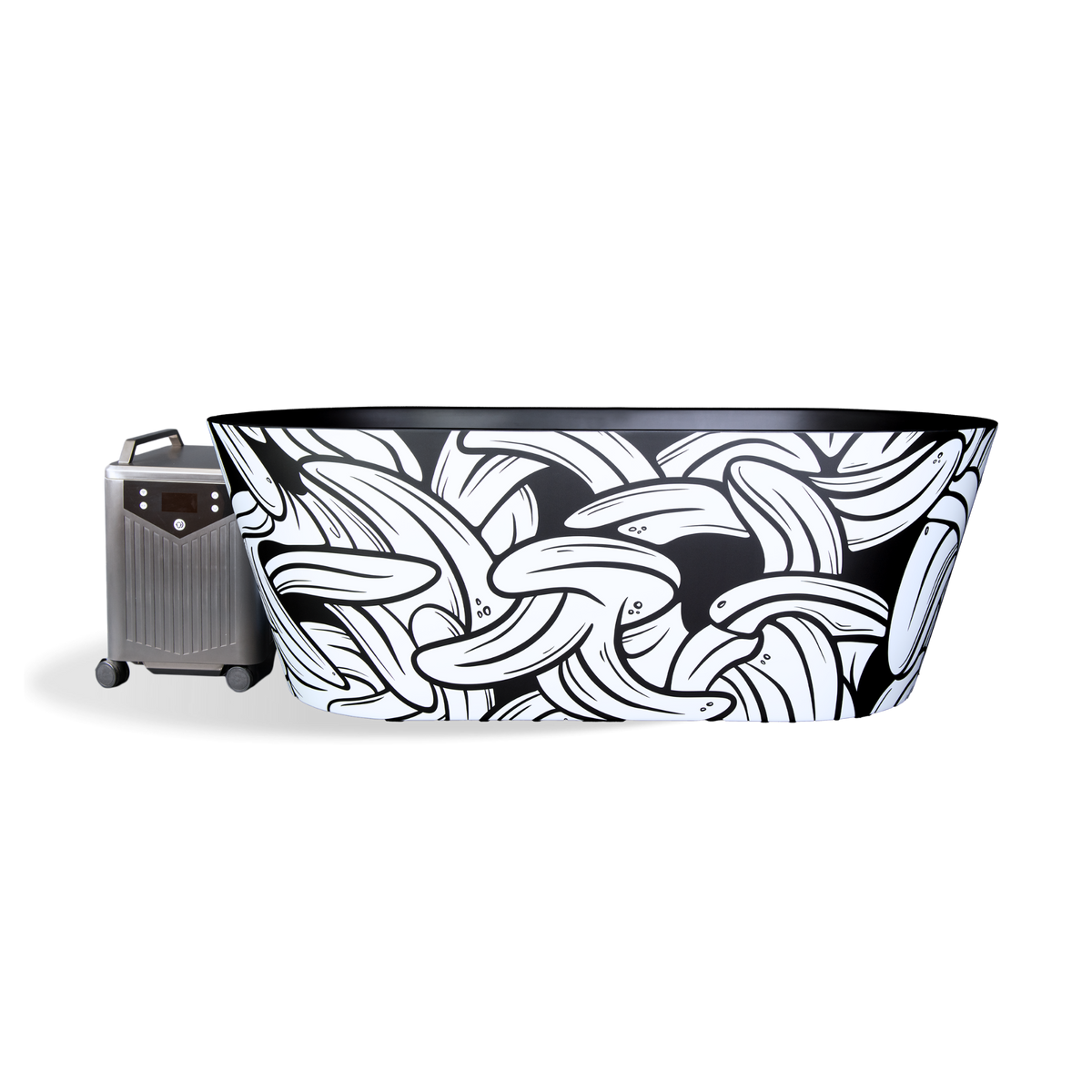 The Brainpod 2.0 Cold Plunge is a portable, insulated acrylic tub decorated with a black and white banana pattern, connected to a grey cooling unit.