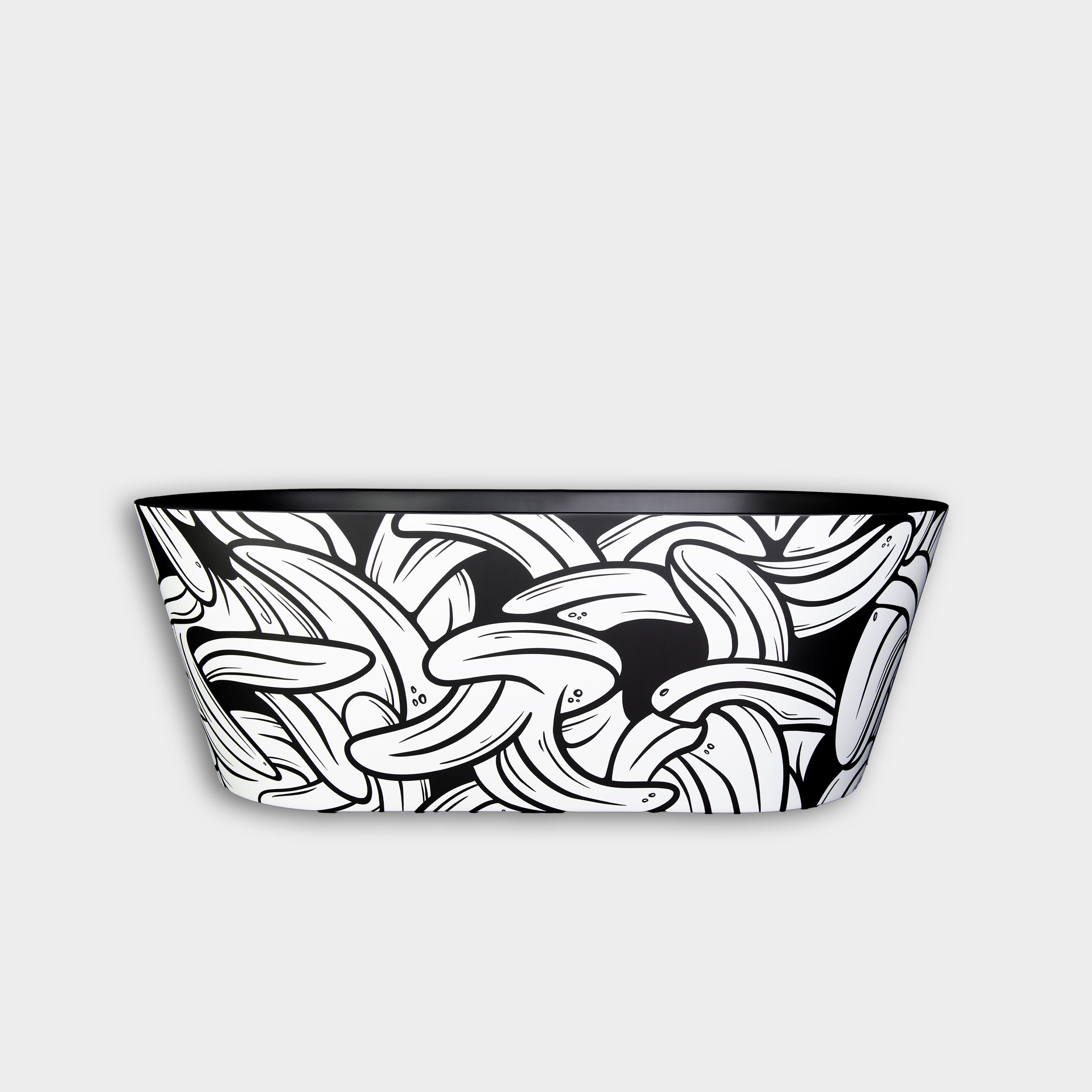 Set against a light gray background, the Brainpod 2.0 Commercial Cold Plunge exudes refreshing energy, featuring a black bowl adorned with playful white bananas outlined in black in an overlapping pattern.