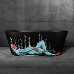 The Brainpod 2.0 Commercial, a black ergonomic bathtub, rests against a gray textured wall adorned with art of a relaxed bather and water splashes—ideal for an inspiring cold plunge experience.