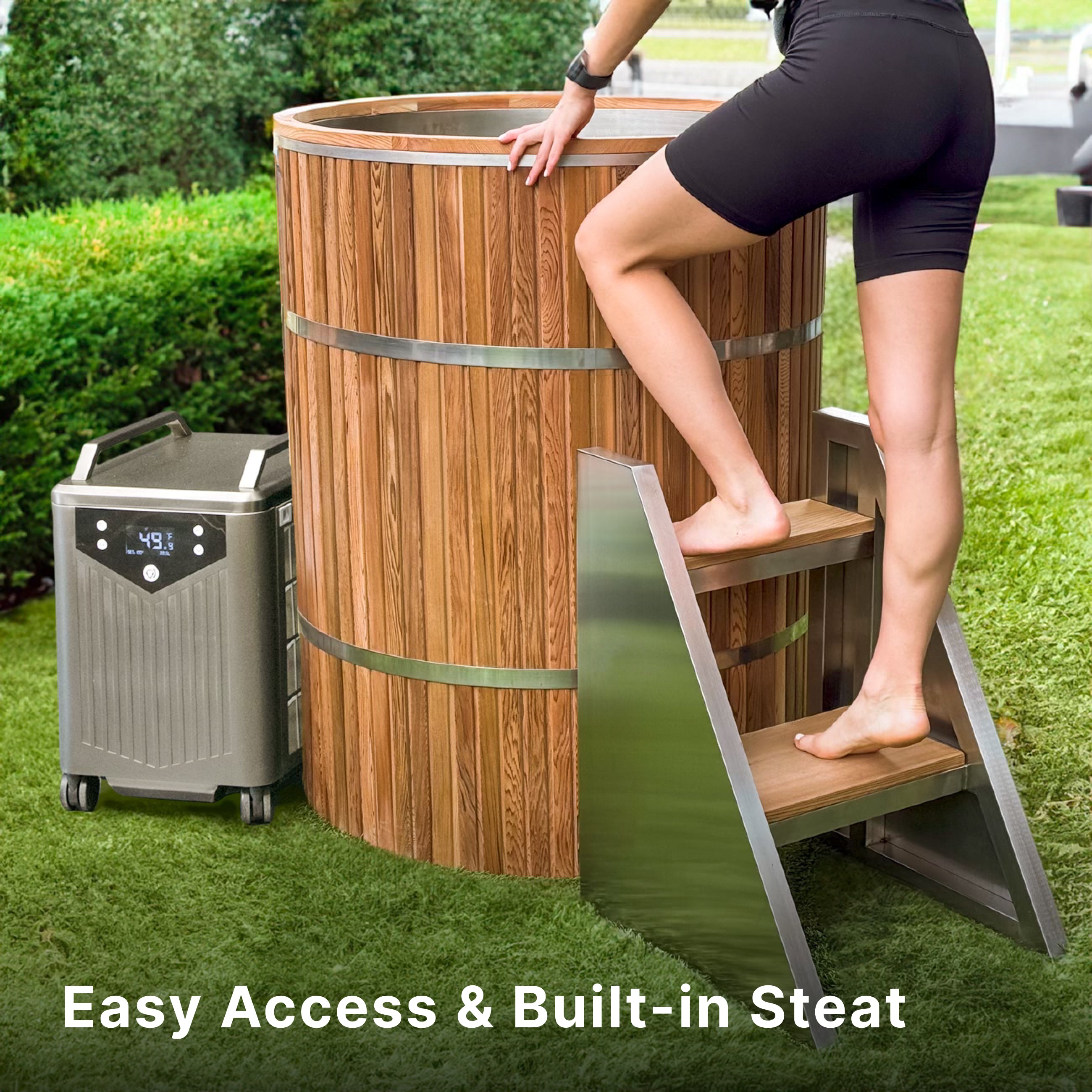 A person steps up a small wooden staircase to enter a round wooden hot tub outdoors, with a digital control unit nearby. Text at the bottom reads, Easy Access & Built-in Steat.