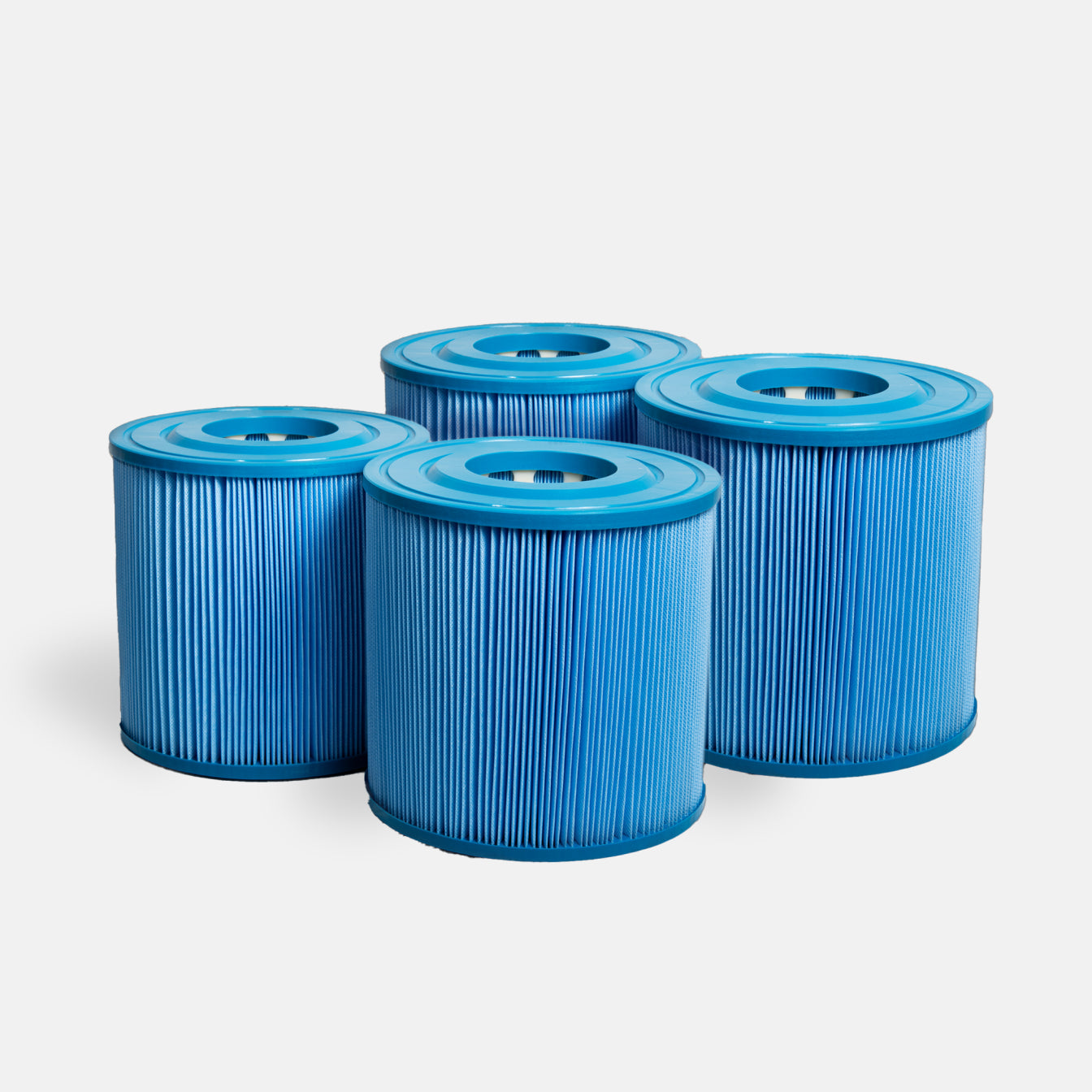 Four blue cylindrical “Filter Replacement for Commercial Systems” filters with pleated sides are arranged closely together on a light grey background, ideal for use in commercial cold plunge system maintenance.