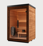 The Mira Natural Sauna is a compact, modern wooden indoor-outdoor sauna featuring a glass door, an interior wooden bench, a bucket with ladle, and a stone heater, displayed against a plain white background.