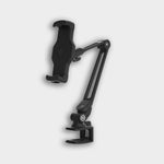 The Smart Device Holder is a black adjustable arm clamp mount with a cradle for tablets or phones. Suction cups provide secure, waterproof placement, making it ideal as a phone holder. Shown isolated on a light gray background.