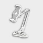 The Smart Device Holder is a white adjustable stand for tablets or phones, featuring suction cups, a sturdy base, articulated arm, and padded grip clamps. Displayed against a plain light gray background.