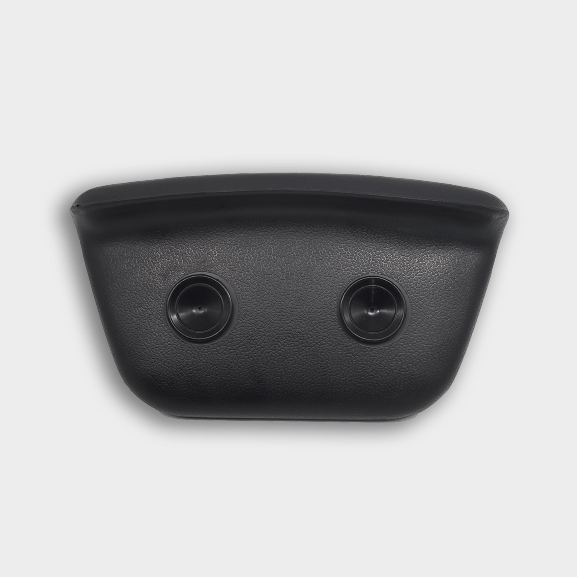 A black, rectangular Waterproof Pillow with a curved top and two round buttons on its front, reminiscent of Polar Monkeys cold plunge gear, set against a plain white background.