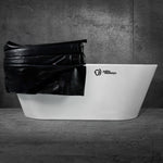 A modern white bathtub with the Polar Monkeys logo is partially covered by the Insulated Cold Plunge Cover, made from marine-grade synthetic leather and insulation foam, set against a dark textured wall and marble floor.