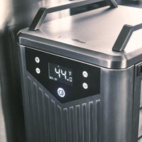 Close-up of the ChillX Chiller’s digital control panel on a stainless steel body with handles, showing 44.1°F and a setpoint of 35°F, plus multiple buttons and indicator lights for a fast-cooling cold plunge experience.