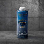 A blue bottle of Sirona Oxidizer sits on a gray marble surface against a textured gray wall. The bottle, designed for clear water, has a white cap and displays product details in white and gold text.