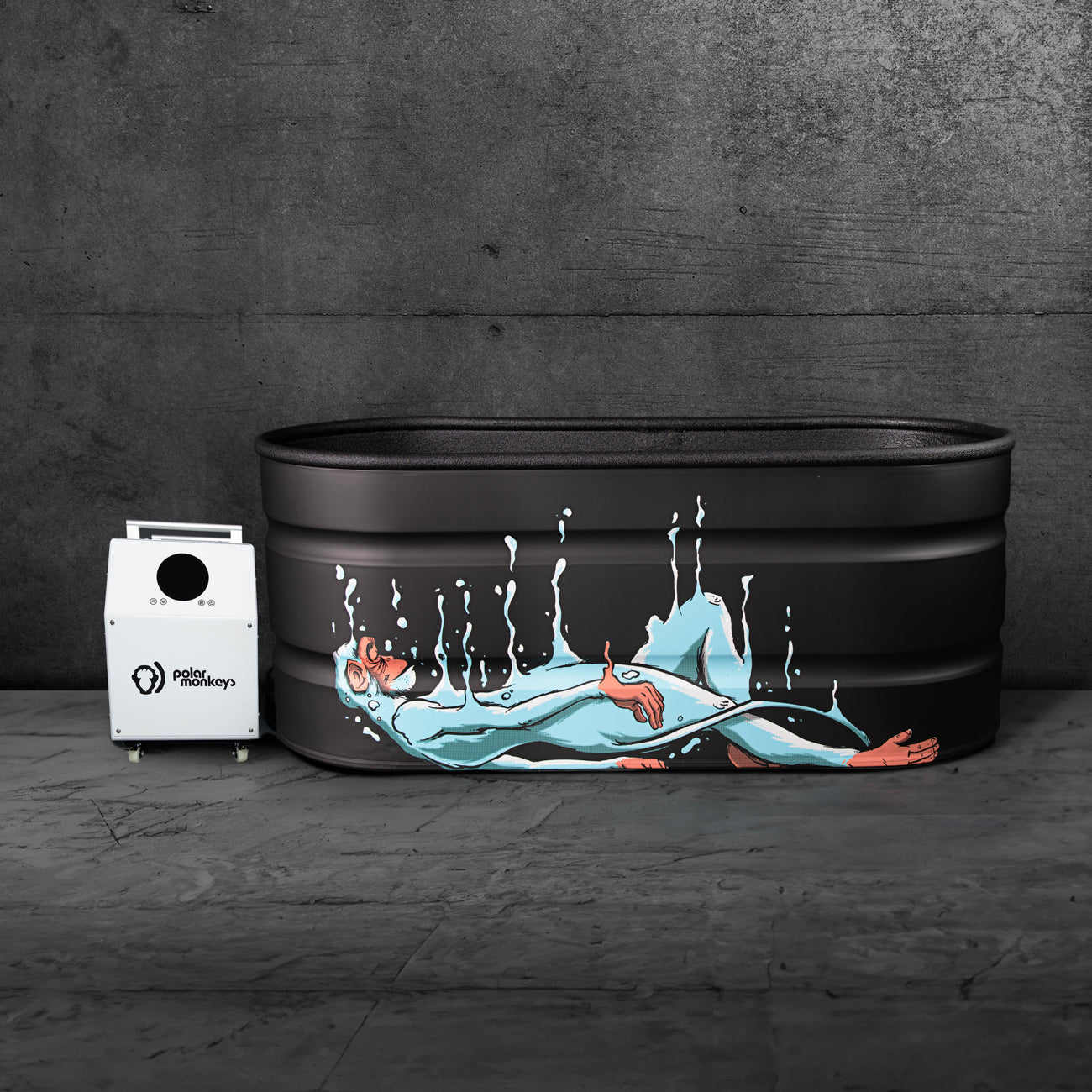 The Portal X, a large black metal tub with a sleek protective coating and artwork of a person floating in water, sits against a gray concrete wall beside a white machine labeled “Polar Recovery.”.