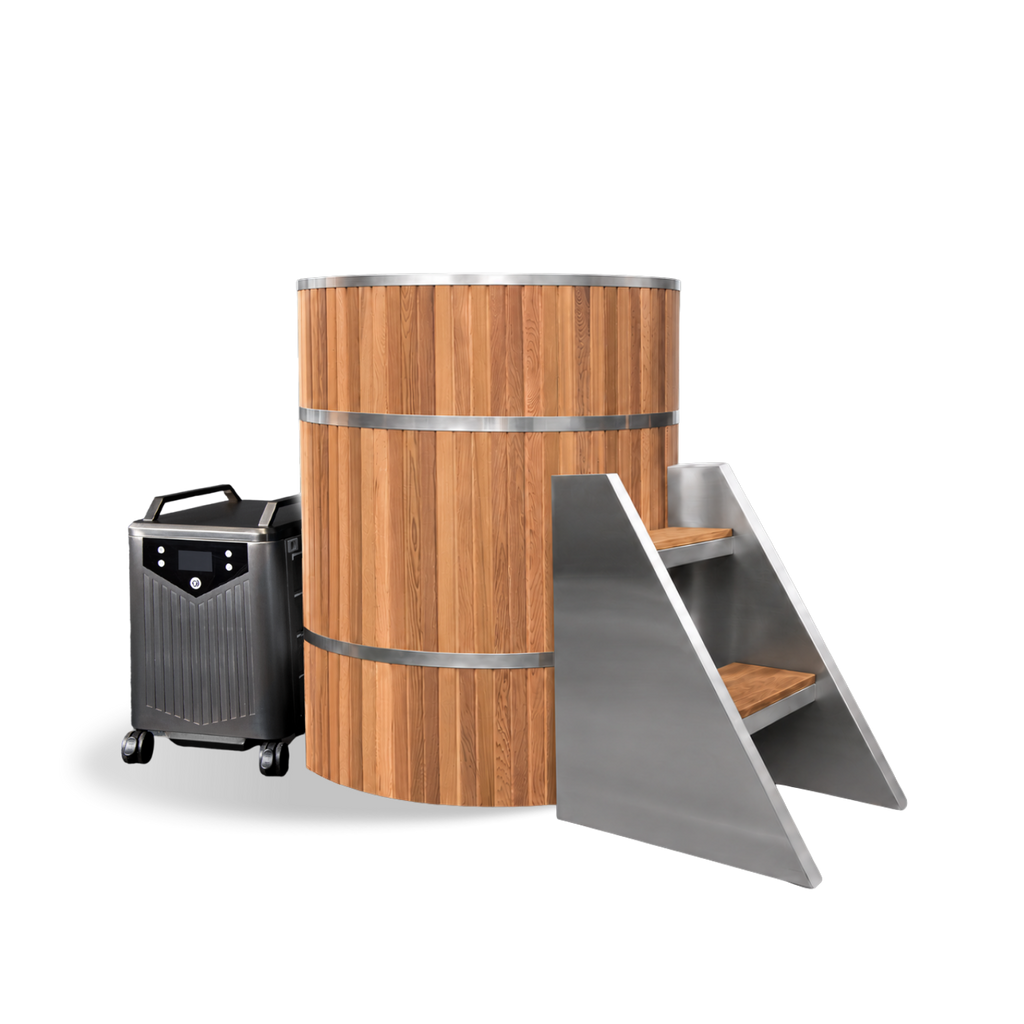 The Barrel wooden tub with metal bands, a set of metal steps, and a portable chiller unit designed for a small space.