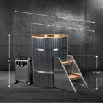 The Star Treatment 2.0, a tall cylindrical cold plunge tub with wood accents, stands next to a metal ladder and portable chiller; white measurements show its height, width, and depth—perfect for compact spaces in gray industrial settings.