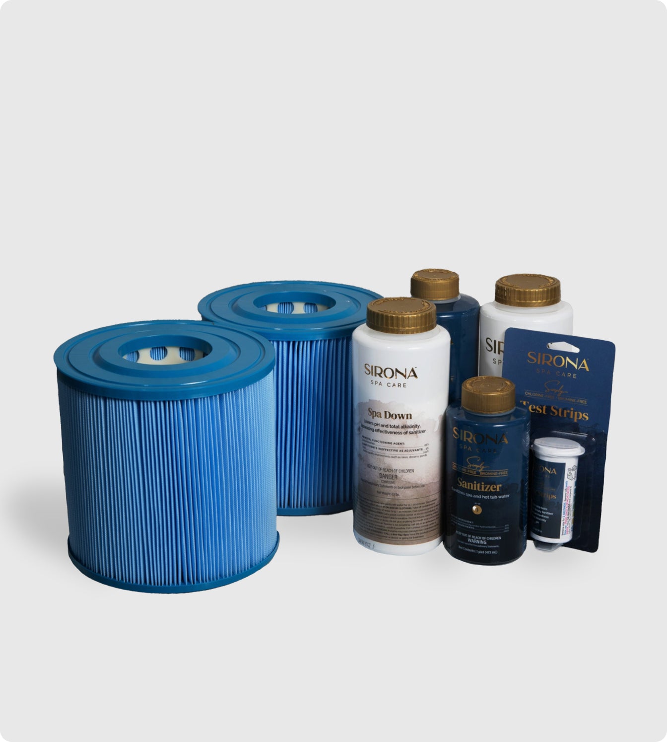 Two blue cold plunge filters are placed beside several Sirona spa care bottles from the 6 Month Care Kit—including chlorine free sanitizer, test strips, and Spa Down—displayed on a plain white background.