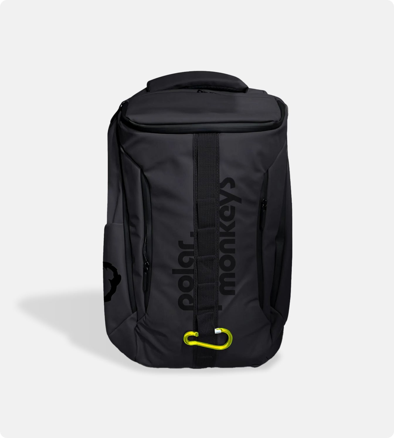 The Vault Backpack is a black everyday backpack with "polar monkeys" in dark vertical letters, a yellow carabiner on the front strap, shown against a light gray background.